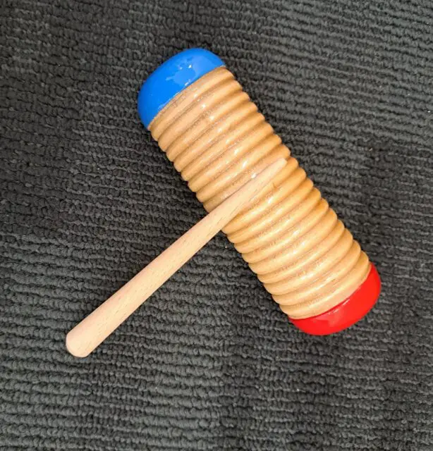 Guiro wooden musical instrument