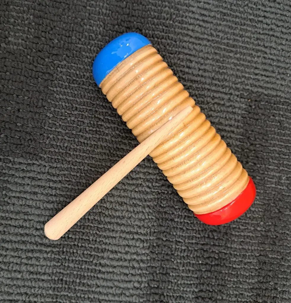 Guiro wooden musical instrument